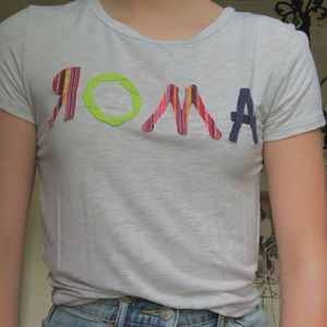 gray top with colorful letters that spells amor